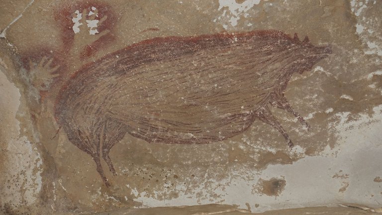 Hallaron la obra de arte rupestre más antigua del mundo
